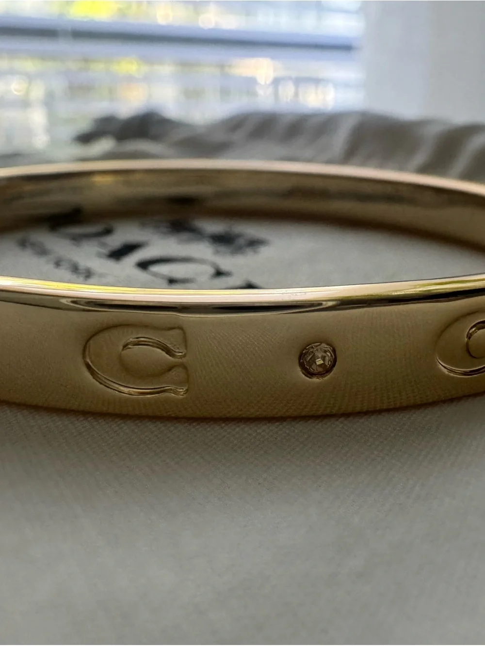 Coach Gold Tone Signature C Logo Bangle Bracelet